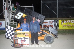 Rob Chaney in  victory lane with race night sponsor, fisher performance, after winning Friday night at Attica Raceway Park. (Action Photo)
