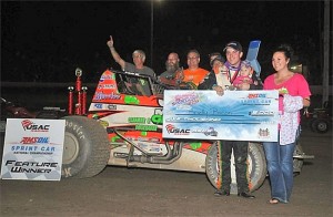 Brady Bacon with his crew and family in victory lane at Tri-State Speedway. (Image courtesy of USAC)