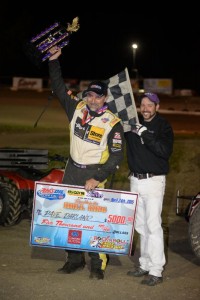 Dave Darland salutes the crowd following his victory on Friday at Eagle Raceway. (Image courtesy of USAC)