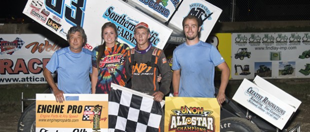 Sheldon Haudenschild with his team in victory lane following this feature victory on Saturday at Attica Raceway Park. (Mike Campbell Photo)