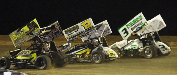 Terry McCarl (24), Bill Balog (17B) and Tim Kaeding (3) race three-wide for the lead in turn two at Jackson Speedway earlier in 2015 (Jeff Bylsma Photo)