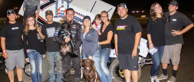 Kyle Hirst and team in victory lane. (Image courtesy of Silver Dollar Speedway)