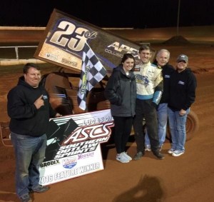 Brian Bell with his crew in victory lane. (Mike Miller Photo)