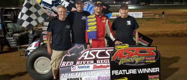 John Carney, II with his crew following his victory Saturday night at Springfield Raceway. (Image courtesy of ASCS)