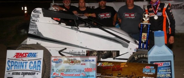 Chad Boespflug and crew celebrate their USAC AMSOIL National Sprint Car victory Friday night at Eagle (Neb.) Raceway's "Rumble in the Bullring."  (RICH FORMAN PHOTO)  