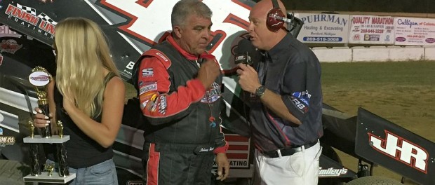 Johnny Herrera being interviewed by Scotty Cook following his feature victory Friday night at the Hartford Motor Speedway. (T.J. Buffenbarger Photo)