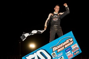 Danny Holtgraver celebrating on top of the wing in Lou Blaney Memorial victory lane at Sharon Speedway.  (Vince Vellella Photo)