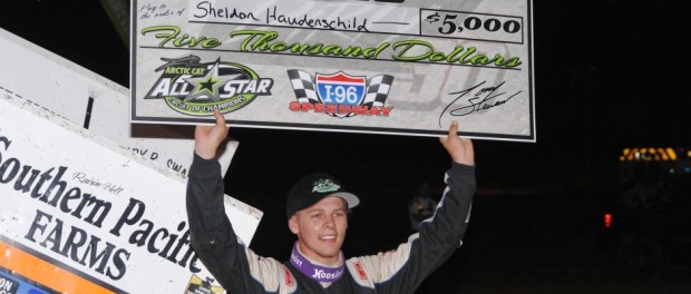 Sheldon Haudenschild with the big check for winning the Dirty 30 at I-96 Speedway on Sunday. (T.J. Buffenbarger Photo)
