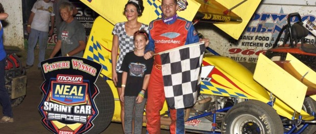 A.J. Bruns in victory lane following his victory during IL Sprint Week with the Neal Tire Midwest Open Wheel Association at Peoria Speedway. (Mark Funderburk Photo)