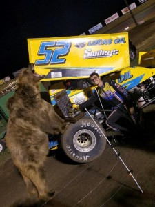Blake Hahn with a bear in victory lane. (ASCS/Diamond D Photo)