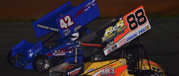 Jimmy McCune (#88) and Jason Blonde (#42) racing for the lead Saturday night at Owosso Speedway. (Chris Seelman Photo)