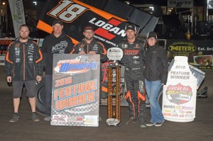 Ian Madsen with his team in victory lane following their victory Friday at Jackson Motorplex. (ASCS / Rob Kocak Photo)