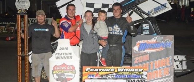 Aaron Reutzel with his team in victory lane following his victory at the Jackson Nationals. (ASCS / Rob Kocak Photo)
