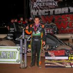 Brady Bacon poses in victory lane after winning Saturday night's USAC Southwest Sprint Car "Western World" feature at Arizona Speedway. (Rich Forman Photo)