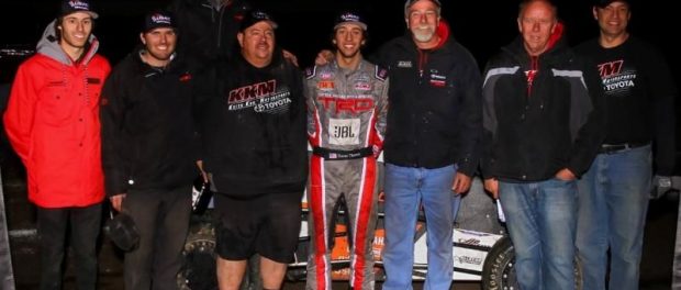   Tanner Thorson (middle) and the Keith Kunz/Curb-Agajanian Motorsports crew celebrate their 2016 USAC National Midget title. (Rich Forman Photo) 