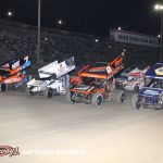 The parade lap before the opening night feature event of the 2024 DIRTcar Winter Nationals at Volusia Speedway Park. (Action Photo)