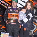 David Gravel with his wife and child after winning the feature event Thursday at Volusia Speedway Park. (Action Photo)