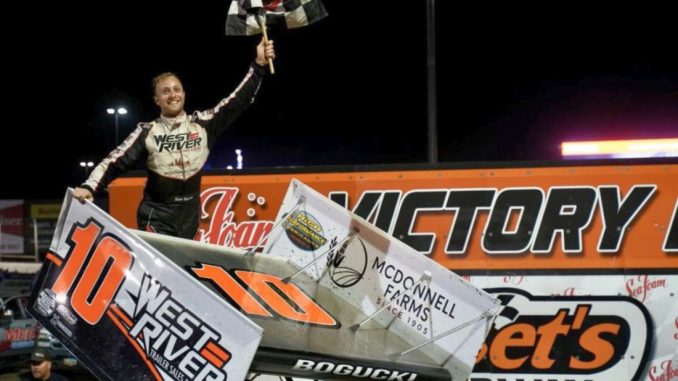 Scot Bogucki celebrates his feature victory Sunday night at Huset's Speedway. (Tyler Porath Photo)