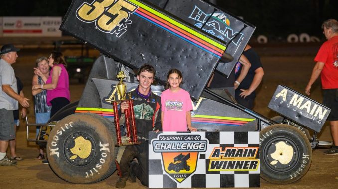 Tyler Thompson in victory lane after his feature win Monday night at Cottage Grove Speedway. (Jason Davenport Photo)