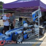 Dave Helliwell going over notes after practice a Berlin Raceway. (T.J. Buffenbarger photo)