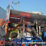 The Henes team making adjustments to the wing of their car. (T.J. Buffenbarger photo)