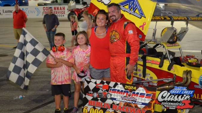 Mike McVetta and his family in victory lane Saturday night at Berlin Raceway. (T.J. Buffenbarger photo)