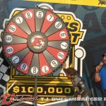 Rico Arberu spins the "Wheel of Doom" to set the inversion for the heat races Wednesday night at Eldora Speedway. (T.J. Buffenbarger Photo)