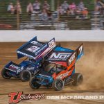 Tyler Courtney (#7) inside of Zeb Wise (#26) Saturday at Portsmouth Raceway Park. (Dan McFarland photo)