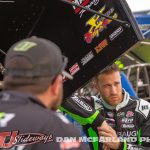 Carson Macedo looking on as the Jason Johnson Racing crew prepares his car for the Jokers Jackpot at Eldora Speedway. (Dan McFarland Photo)