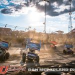 The field roars through turns one and two during the Jokers Wild Thursday night at Eldora Speedway. (Dan McFarland Photo)