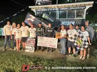 Darin Naida in victory lane with the Chuck Wilson's family after winning at Butler Motor Speedway in 2023. (T.J. Buffenbarger Photo)