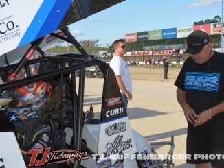 Rico Abreu strapped in for hot laps as crew chief Ricky Warner takes a final look over the race car. (T.J. Buffenbarger Photo)