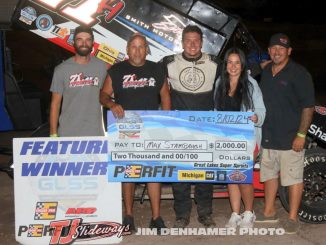 Max Stambaugh with his crew in victory lane Friday at Tri-City Motor Speedway. (Jim Denhamer Photo)