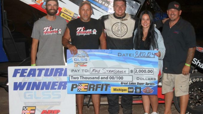 Max Stambaugh with his crew in victory lane Friday at Tri-City Motor Speedway. (Jim Denhamer Photo)