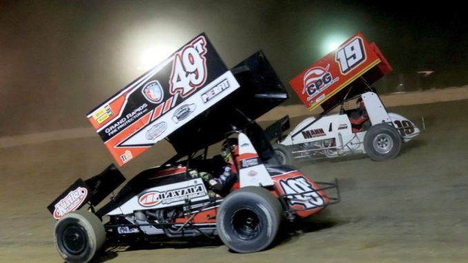 Gregg Dalman (#49T) racing with Jett Mann (#19) Friday at Hartford Motor Speedway. (Jim Denhamer Photo)