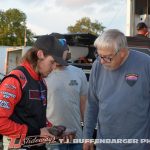 Max Frank going over some mechanical issues with his race team. (T.J. Buffenbarger Photo)