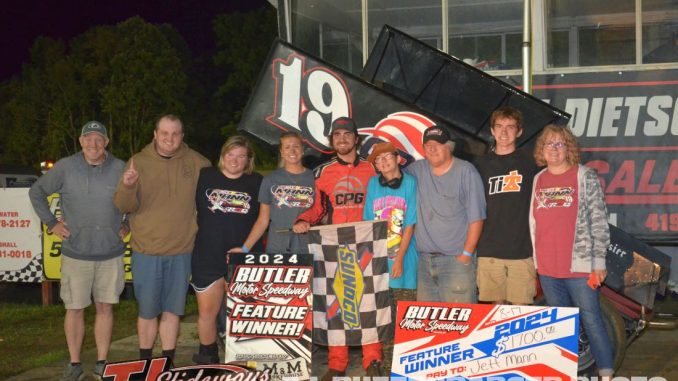 Jett Mann with his family and crew in victory lane Saturday night at Butler Motor Speedway. (T.J. Buffenbarger Photo)