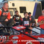 Shane and Landon Butler watch qualifying with their crew at Kalamazoo Speedway. (T.J .Buffenbarger Photo)