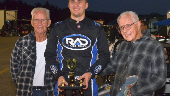 (L to R) Don Kenyon, USSA Kenyon Midget feature winner Ryan Huggler, and Mel Kenyon after Friday night's feature at Kalamazoo Speedway. (T.J. Buffenbarger Photo)