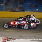 Tyler Roahrig (#56) passing Jake Trainor (#29) for the lead Saturday night at Berlin Raceway. (T.J. Buffenbarger Photo)