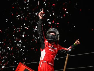 Hank Davis celebrates his feature victory Friday at Electric City Speedway. (Emily Schwanke Photo)