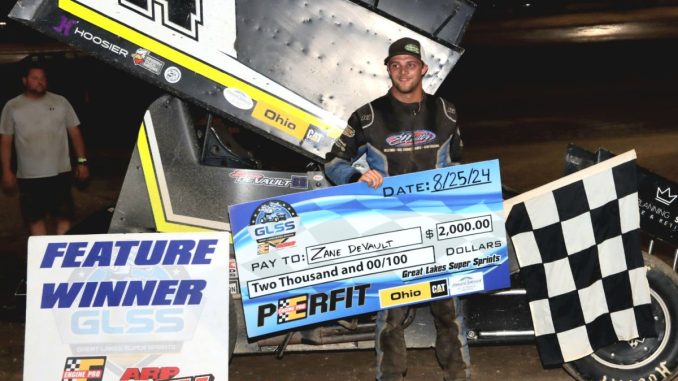 Zane Devault in victory lane Sunday night at Millstream Speedway. (Jim Denhamer Photo)