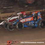 Justin Grant (#4) racing with Kyle Cummins (#3) Thursday night at Kokomo Speedway. (Jim Denhamer Photo)