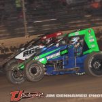 Harley Burns (#16) inside of Carson Garrett (#15) Thursday night at Kokomo Speedway. (Jim Denhamer Photo)