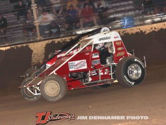 Robert Ballou (#12) inside of C.J. Leary (#15) for position Thursday night at Kokomo Speedway. (Jim Denhamer Photo)