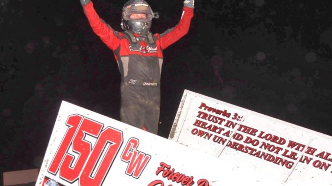 Craig Mintz celebrates his feature victory Friday at I-96 Speedway. (Jim Denhamer Photo)