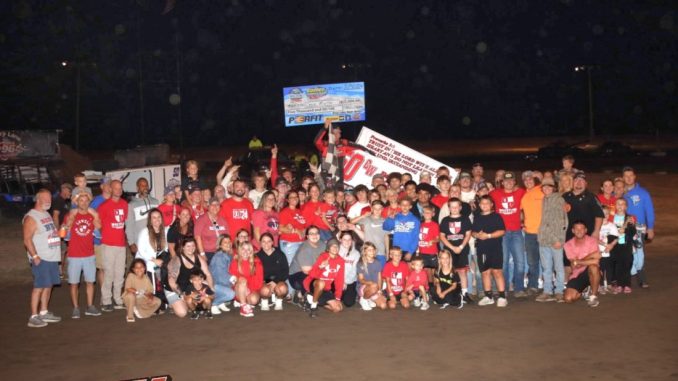 Craig Mintz along with family and friends of Chase Wilder in victory lane at I-96 Speedway. (Jim Denhamer Photo)