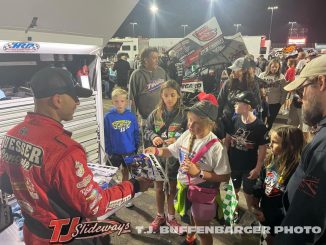 Bill Balog signing autographs after his fifth place run Thursday at Knoxville Raceway. (T.J. Buffenbarger Photo)