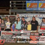 Karter Sarff in victory lane with his family and crew at Federated Auto Parts Raceway. (Mark Funderburk Photo)