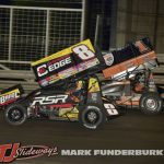 Cory Eliason (#8) racing with Tasker Phillips (#1) Thursday at Knoxville Raceway. (Mark Funderburk Photo)